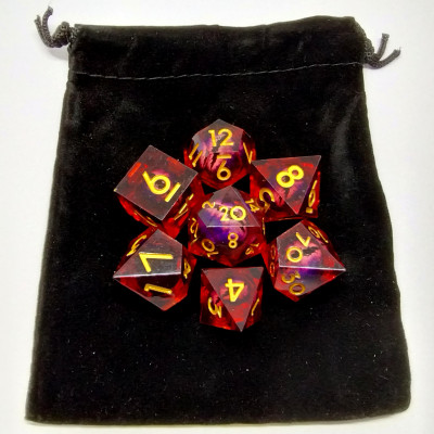 Kit de dés "Liquid Core" Oeil de Dragon - rouge avec pochette en suédine noir